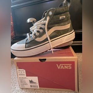 Green suede Vans (never worn). Women’s size 6.5.